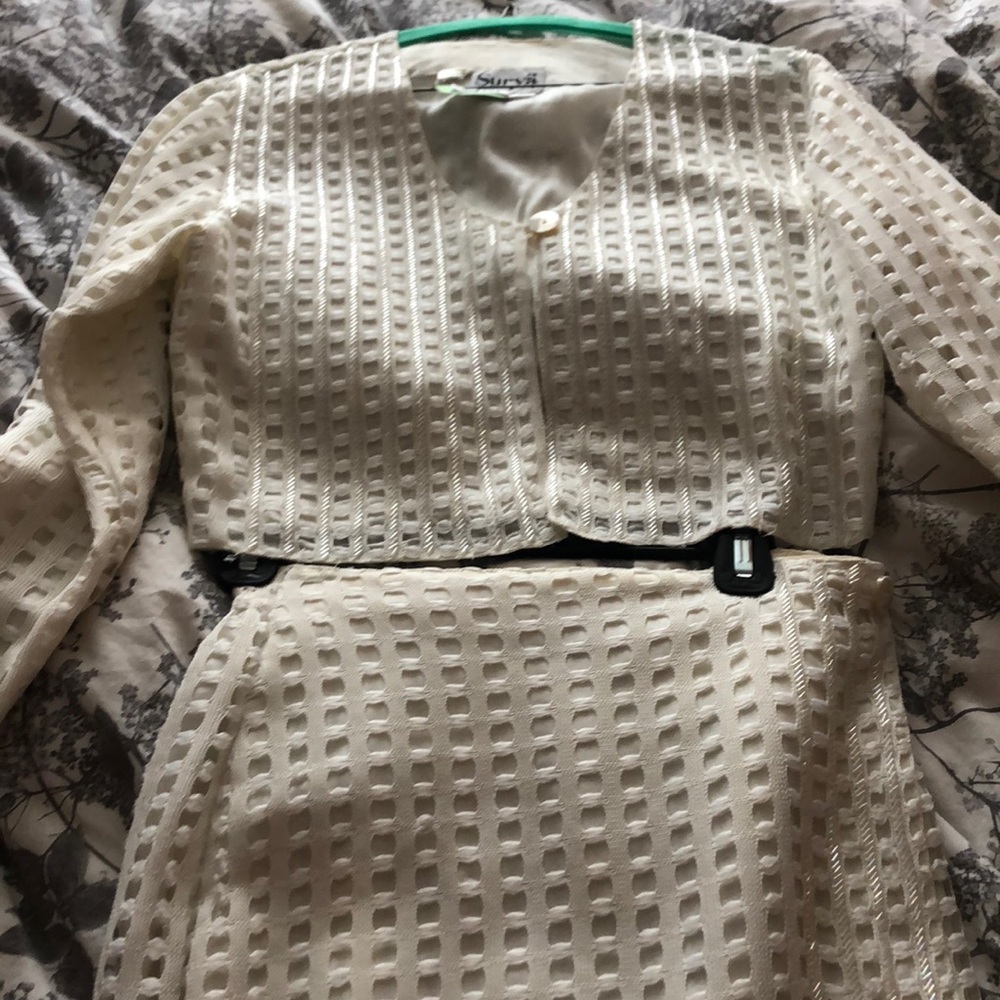 Beautiful beaded two piece suit. Looks amazing on